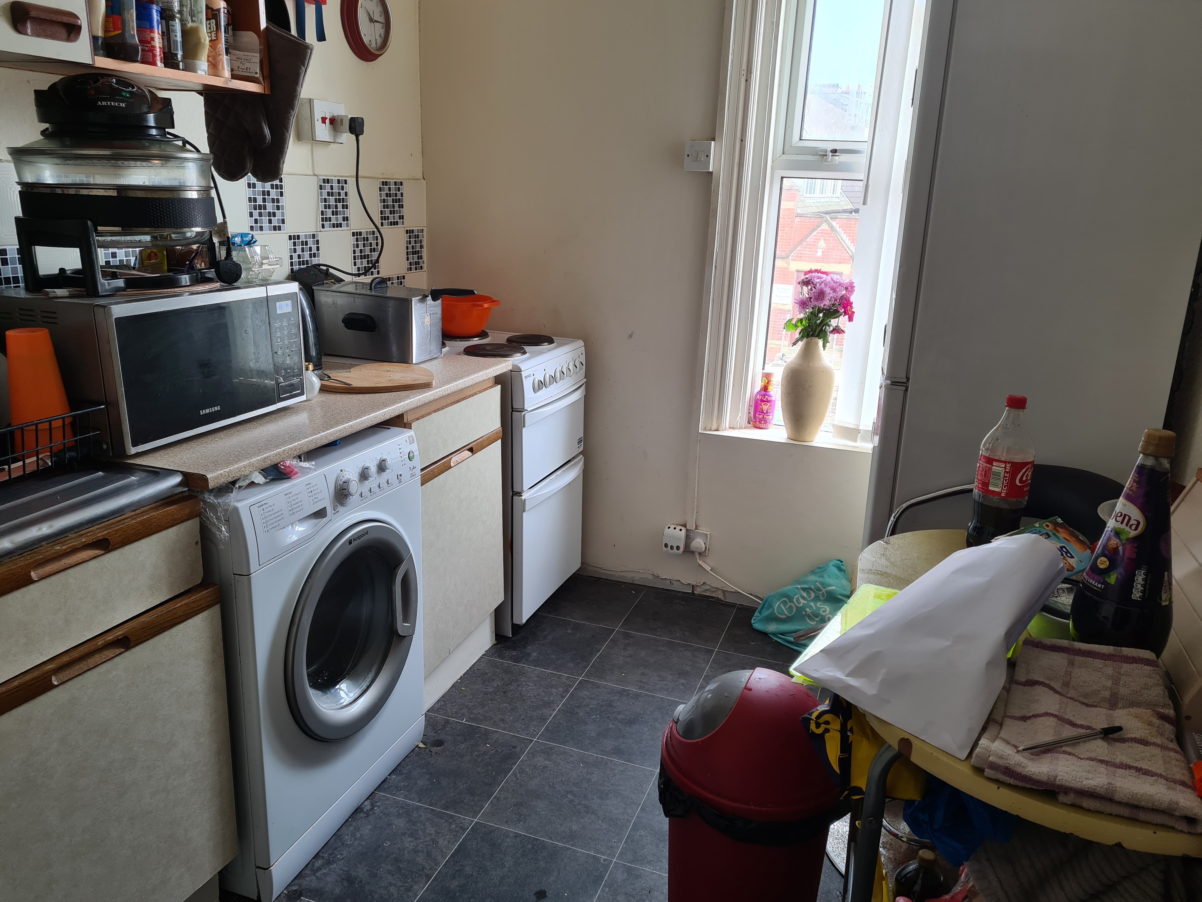 INVESTMENT/VACANT - Freehold Mid Terrace Building providing Four self-contained Flats
