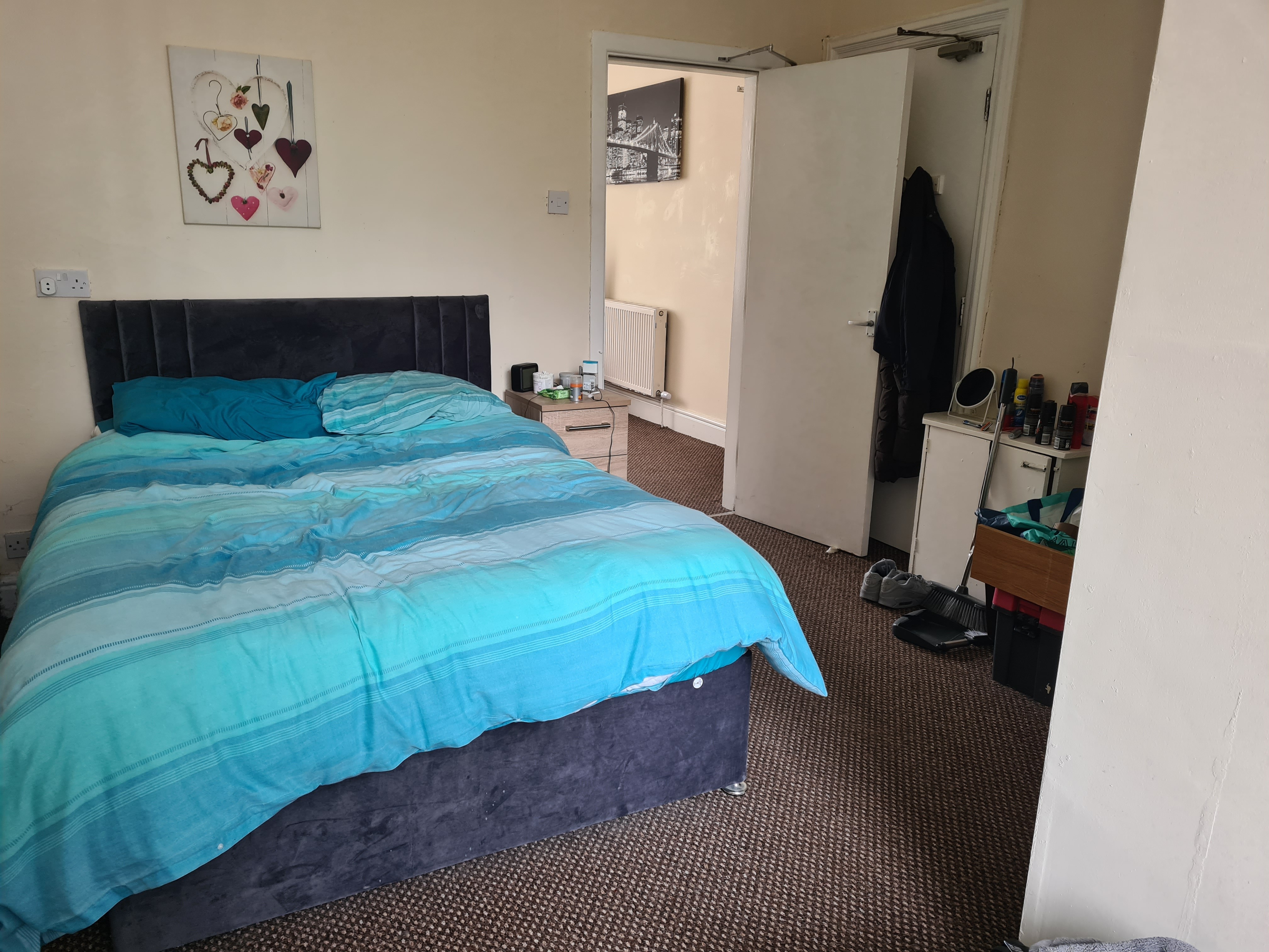 INVESTMENT/VACANT - Freehold Mid Terrace Building providing Four self-contained Flats