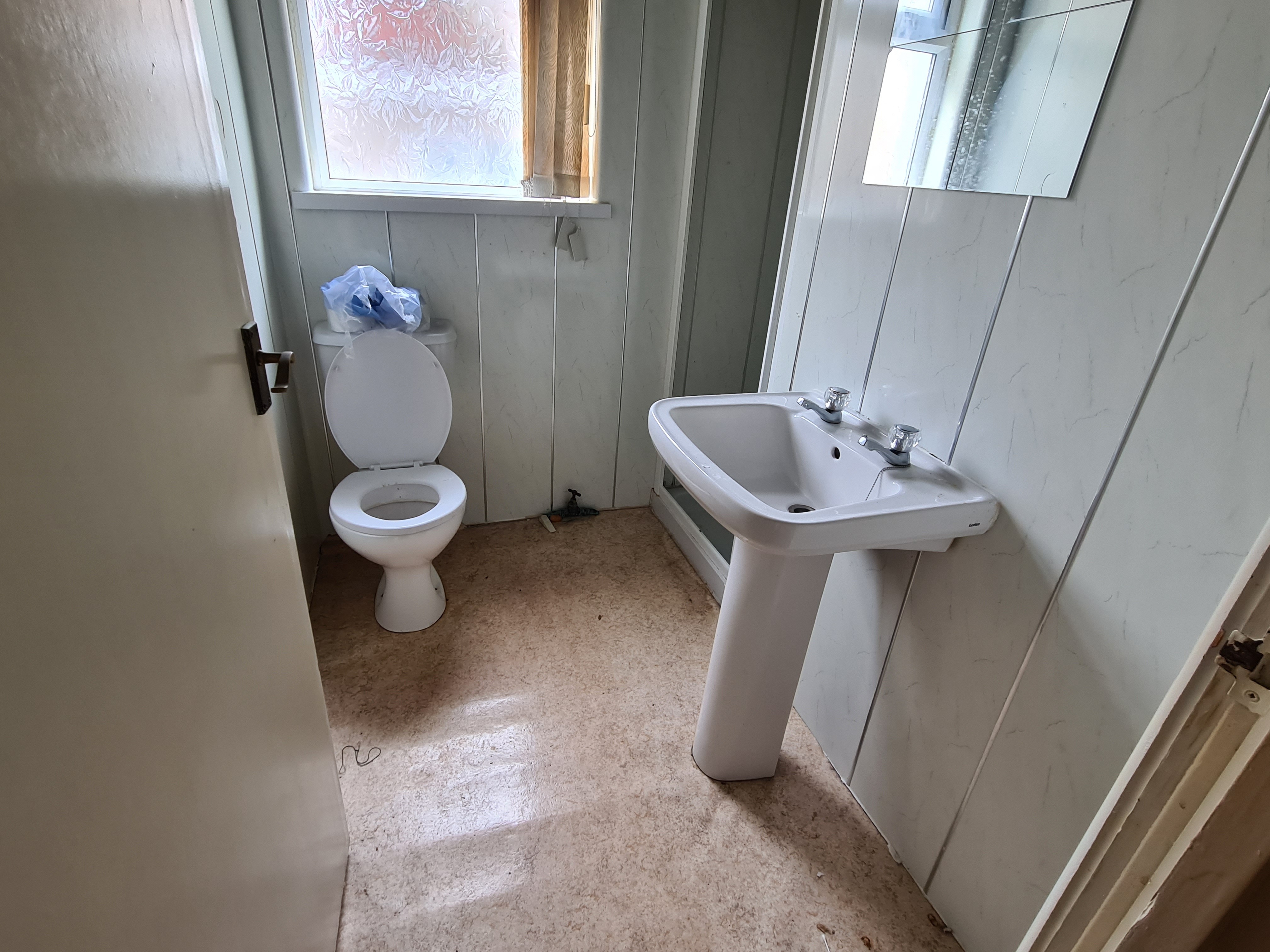 INVESTMENT/VACANT - Freehold Mid Terrace Building providing Four self-contained Flats