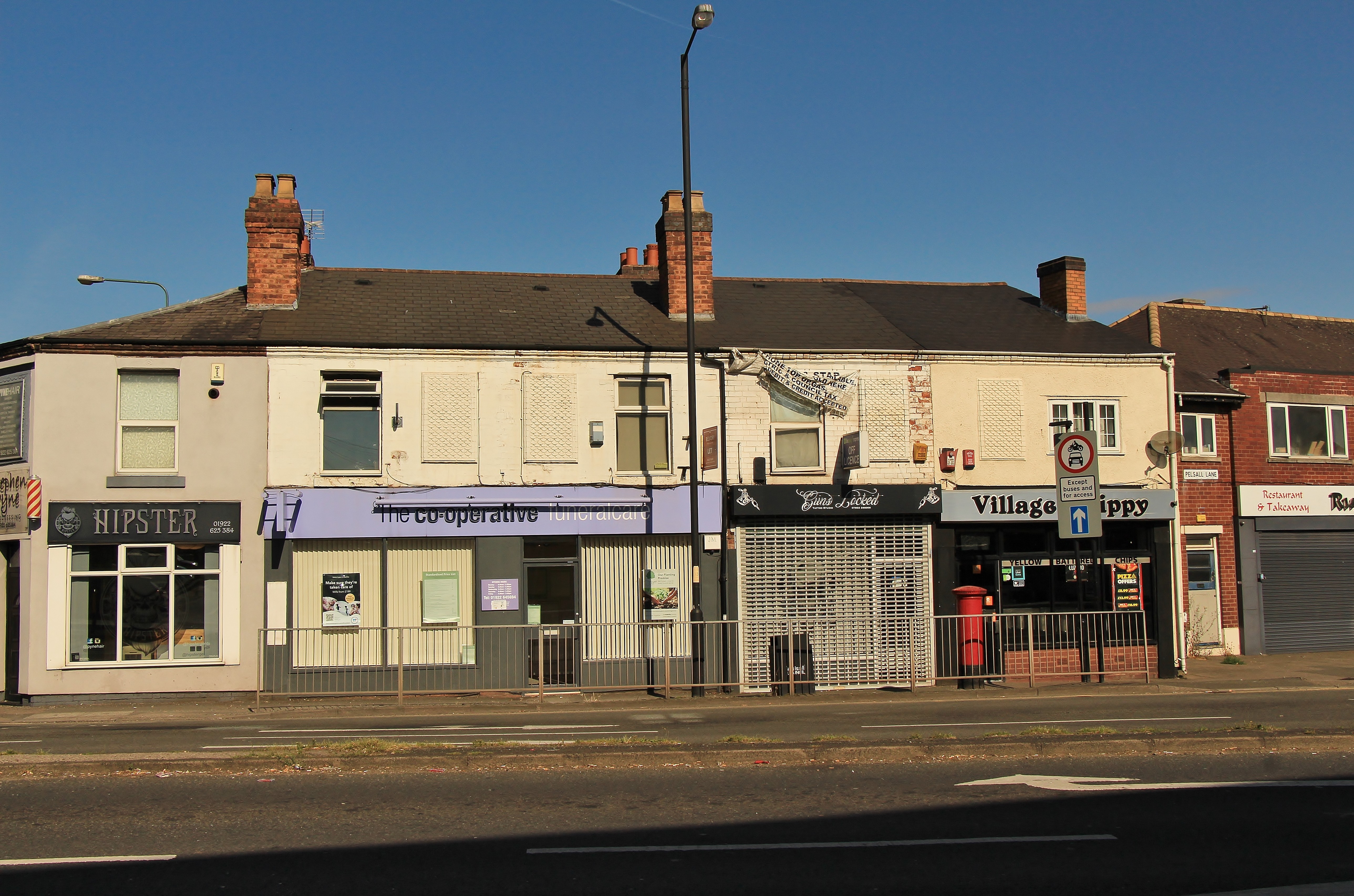INVESTMENT - Freehold Building comprising Shop Unit with Self Contained Flat above