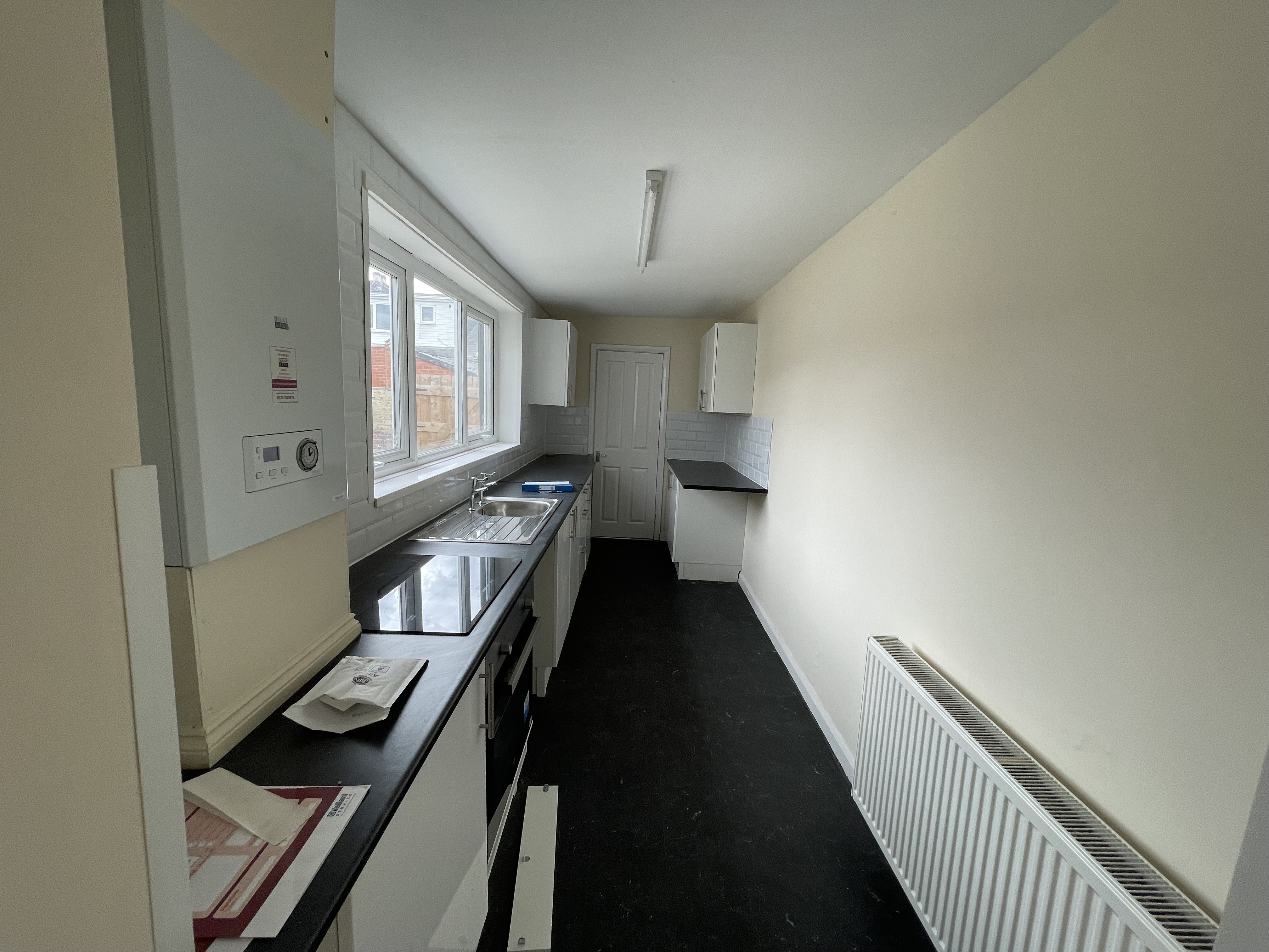 VACANT - Freehold Mid Terrace Bungalow