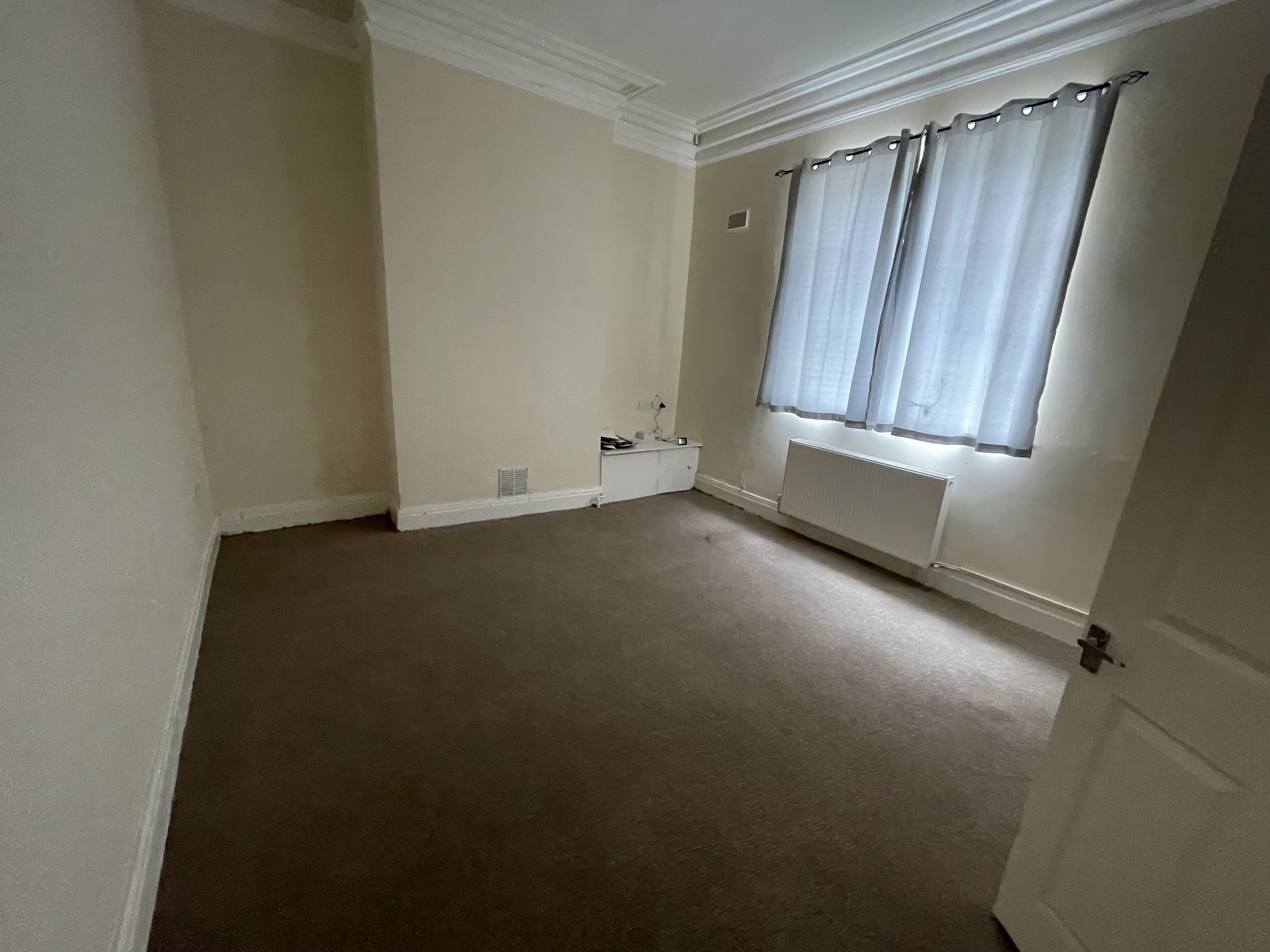 VACANT - Freehold Mid Terrace Bungalow