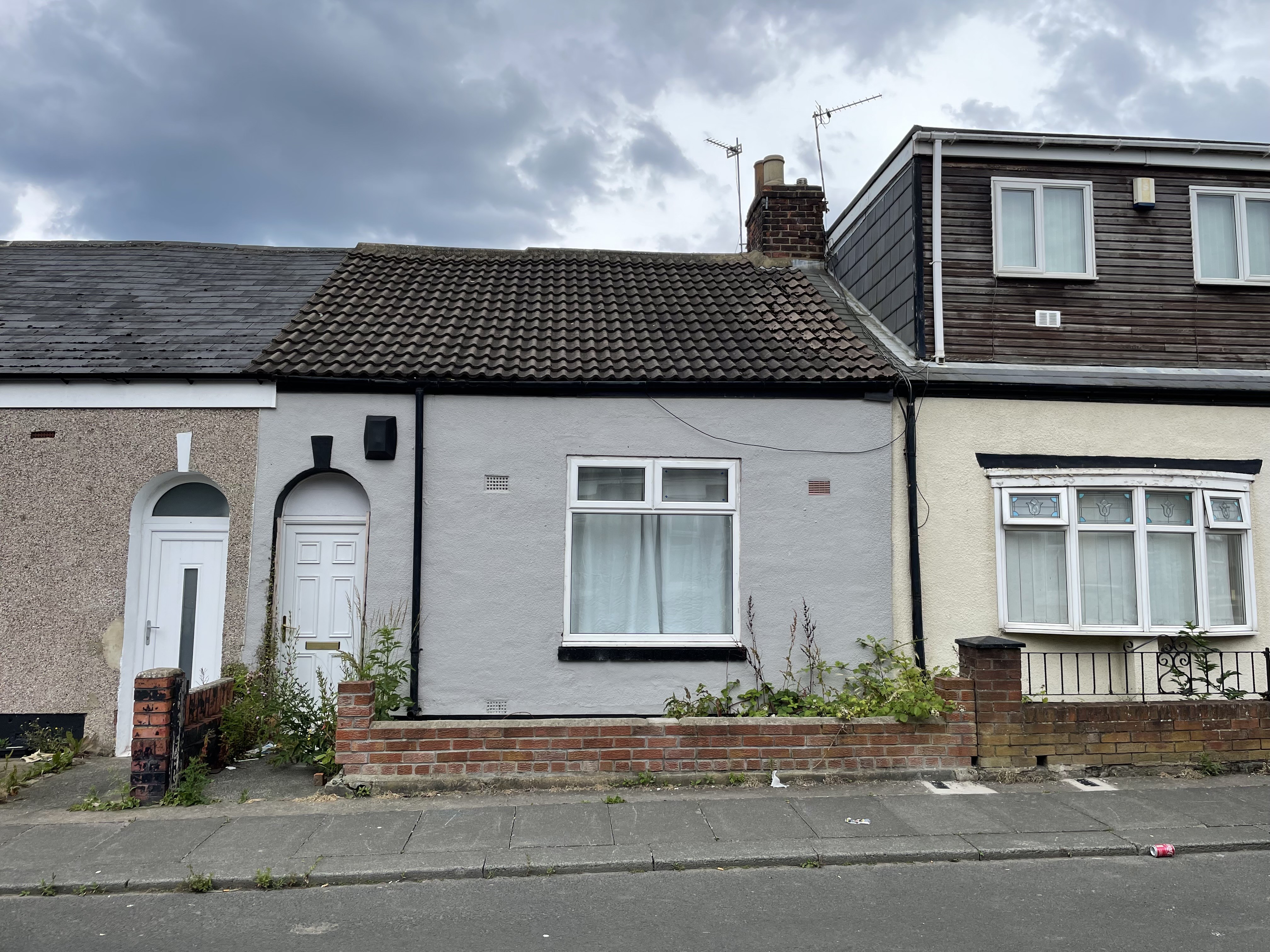 VACANT - Freehold Mid Terrace Bungalow
