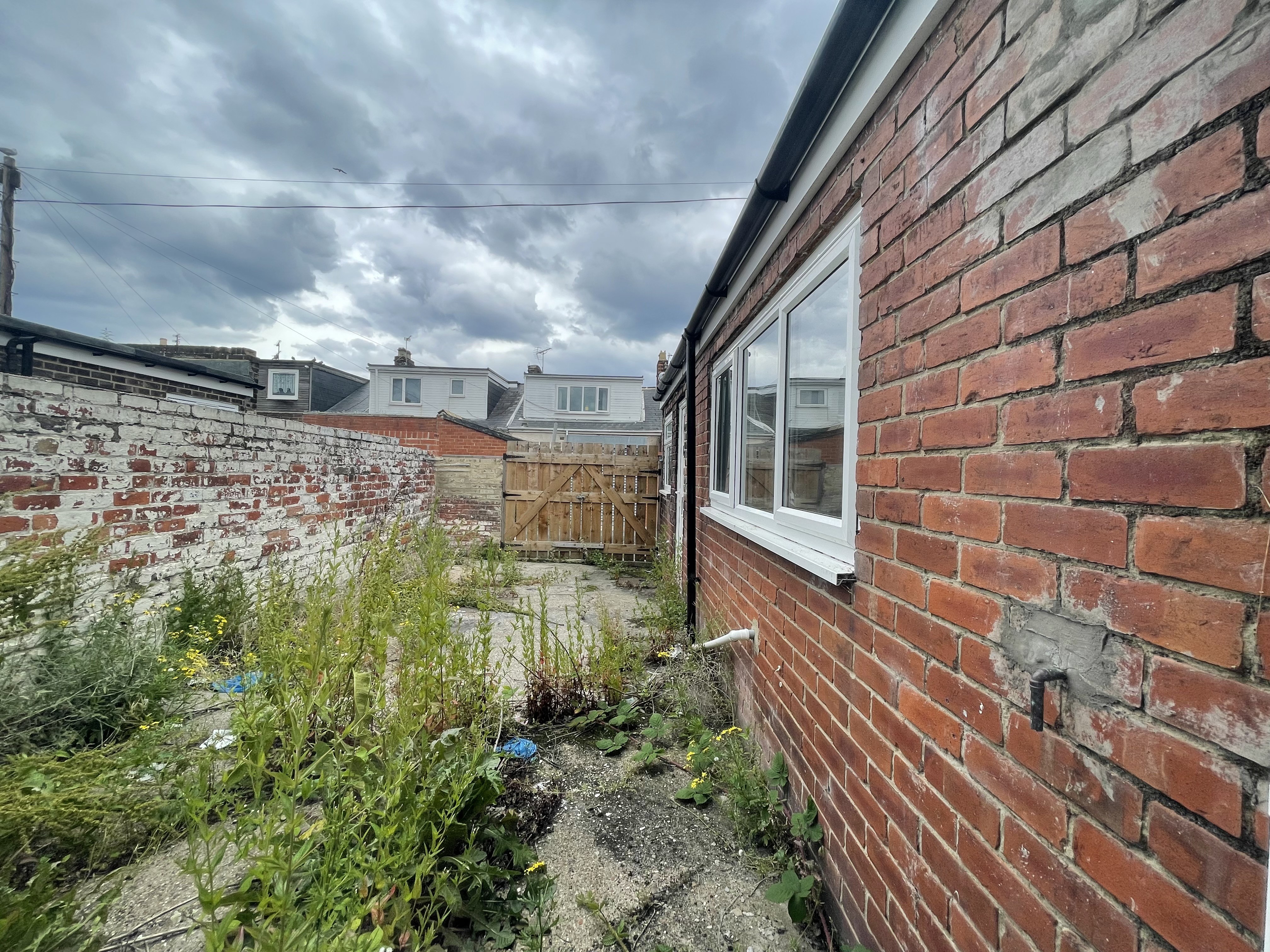 VACANT - Freehold Mid Terrace Bungalow