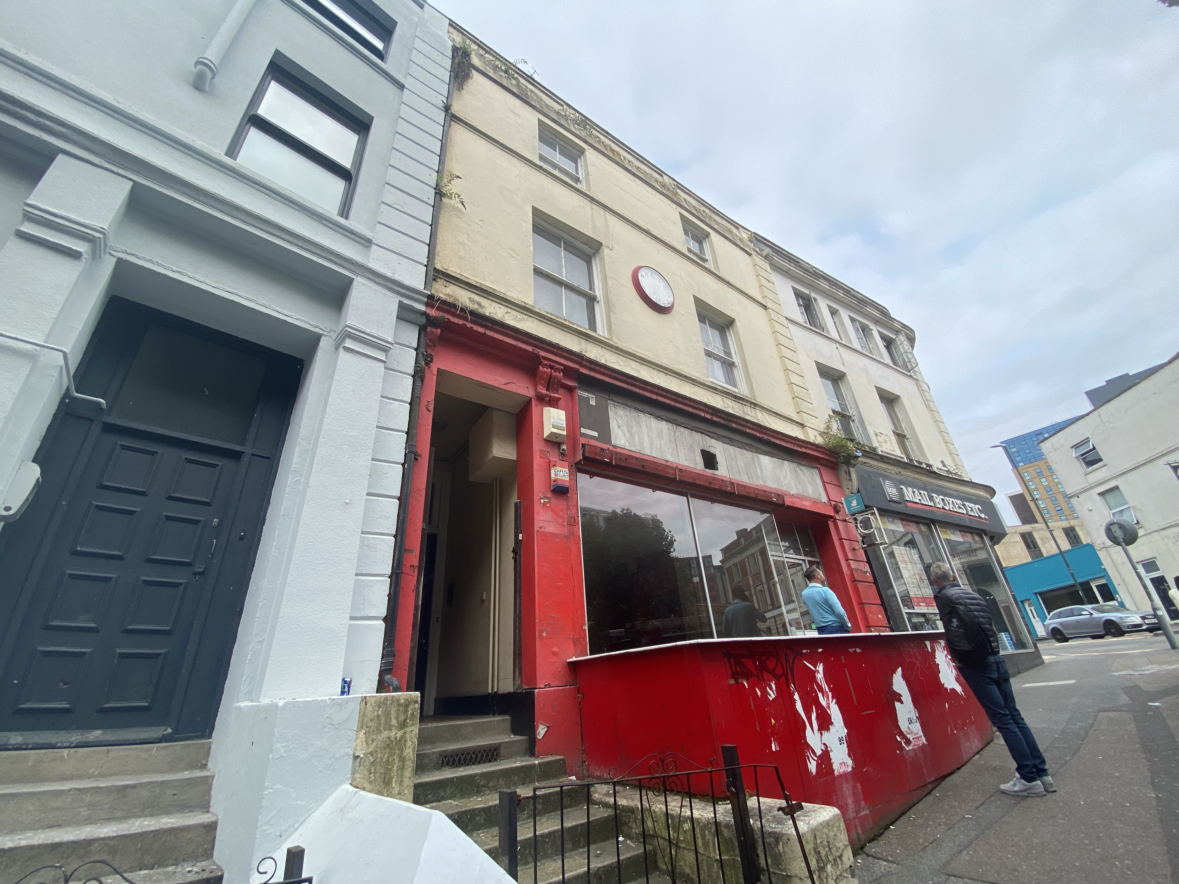 INVESTMENT - Freehold Corner Building Arranged as Three Commercial Units and 13 Flats 