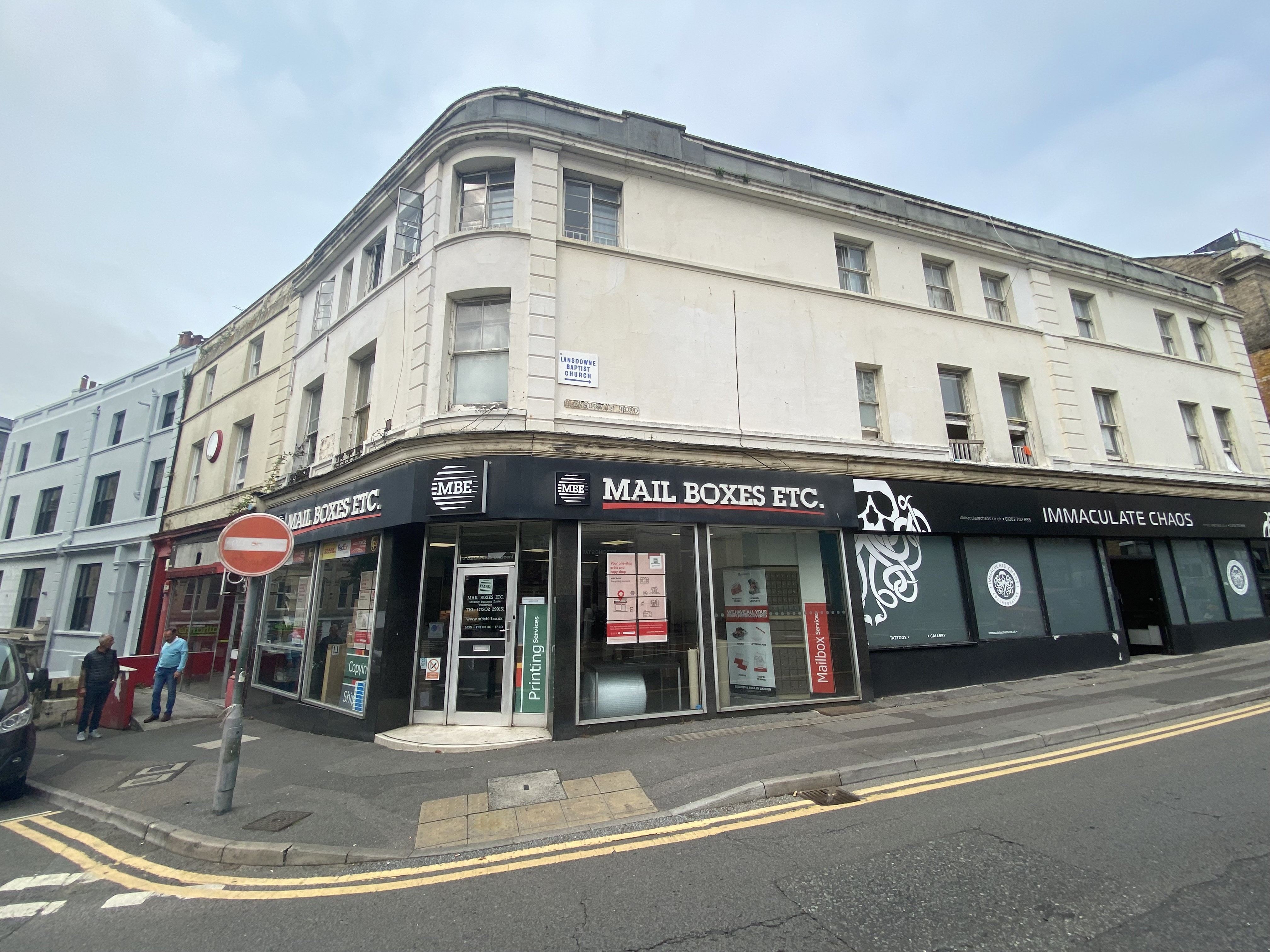 INVESTMENT - Freehold Corner Building Arranged as Three Commercial Units and 13 Flats 