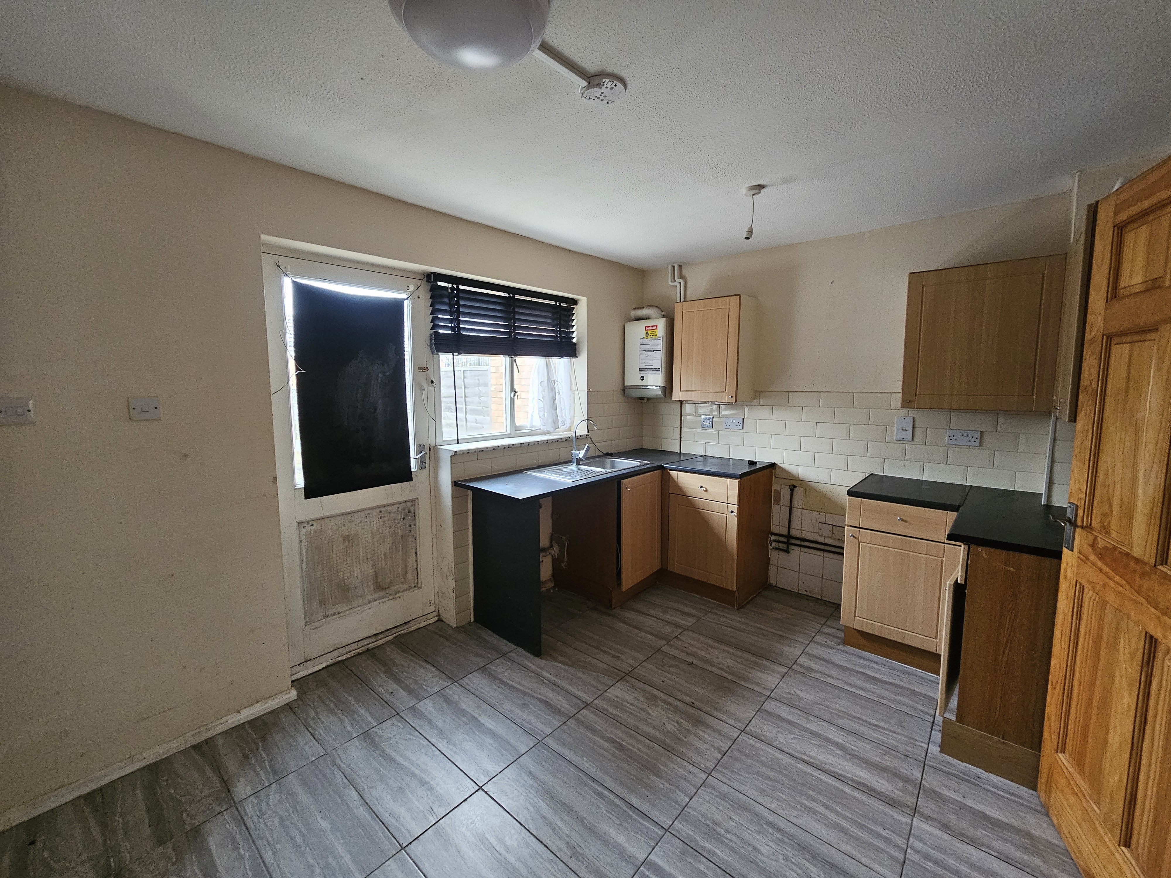 VACANT - Freehold Mid Terrace House