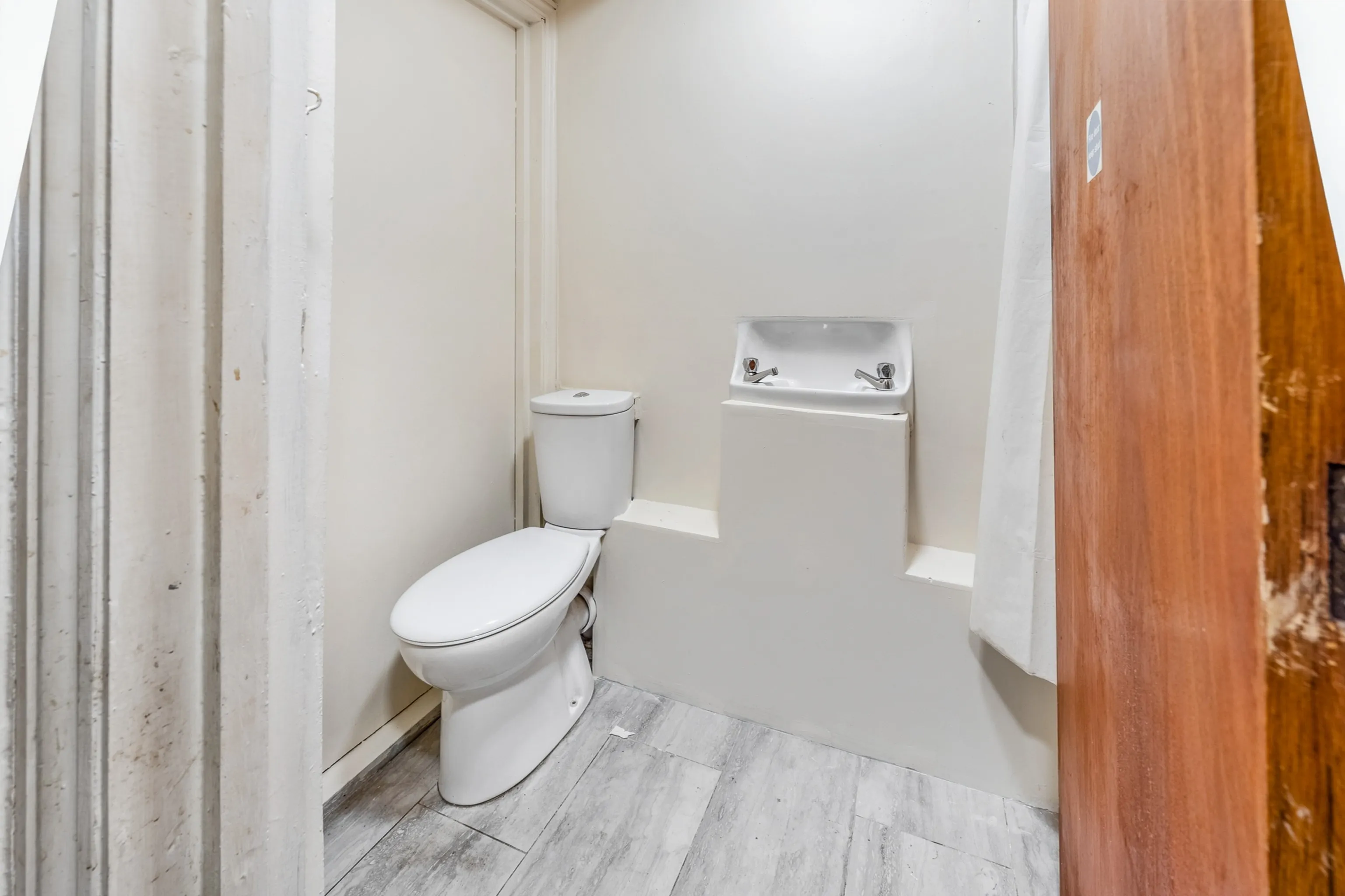 INVESTMENT - Well Located Freehold Semi-Detached HMO Building