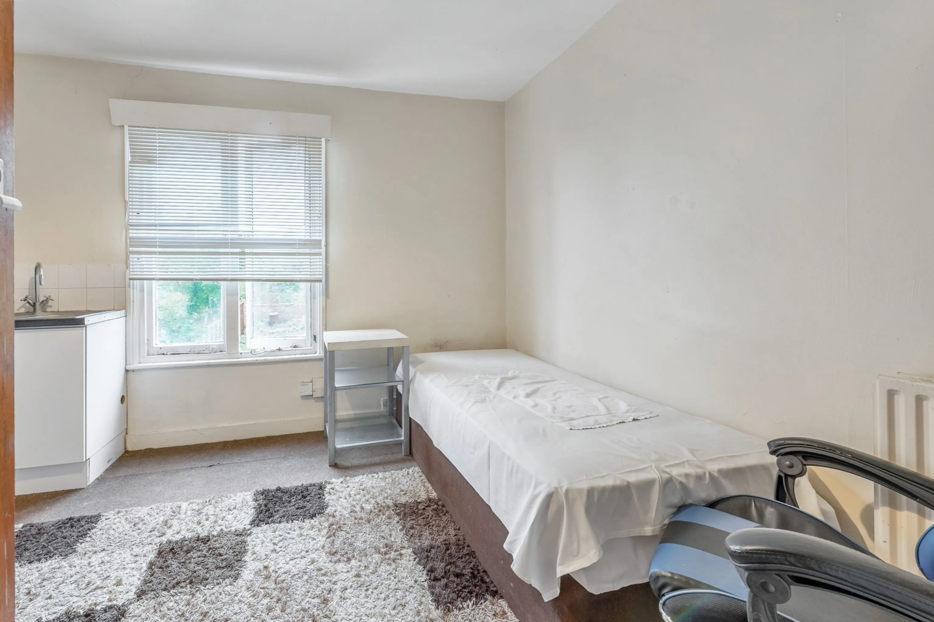 INVESTMENT - Well Located Freehold Semi-Detached HMO Building