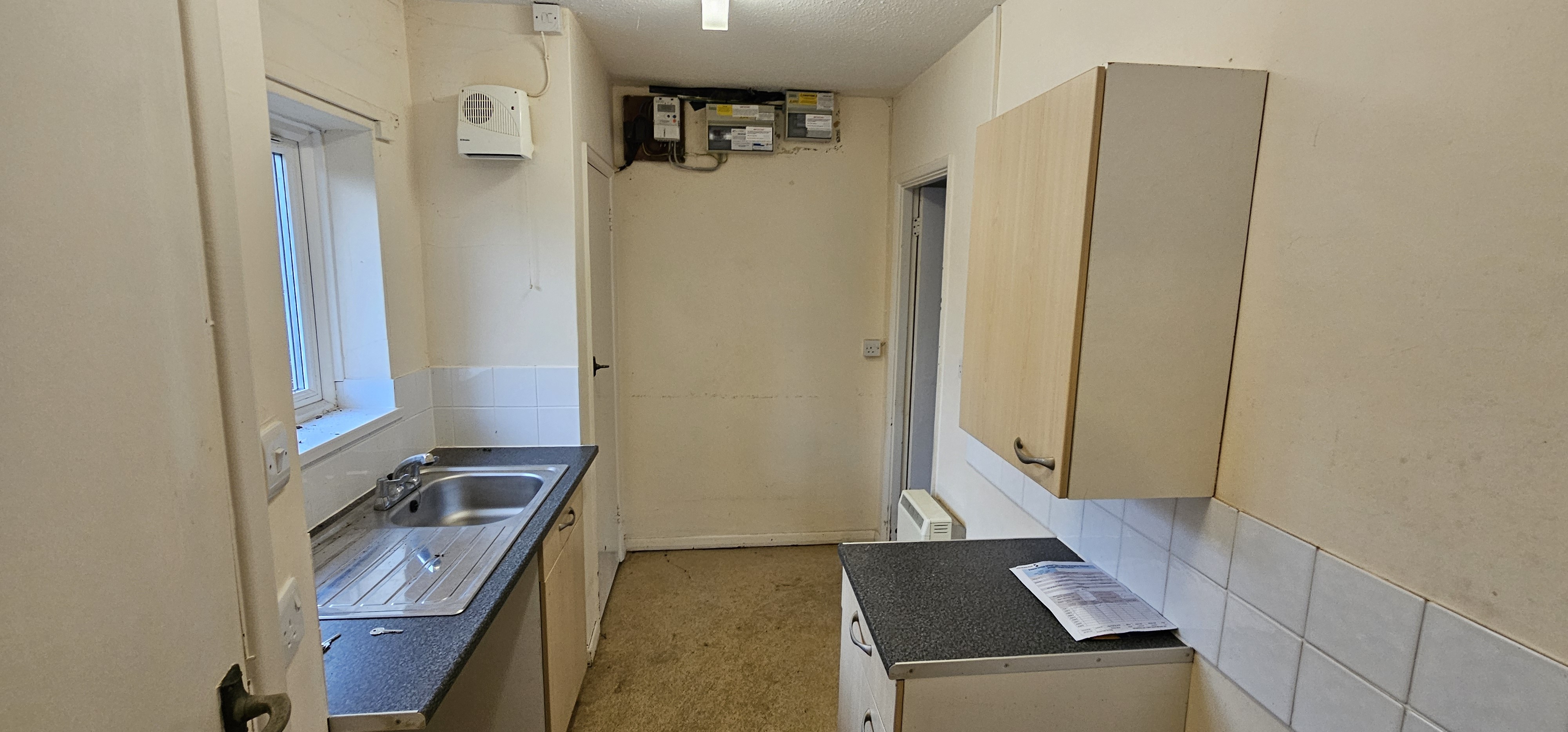 VACANT - Freehold Mid Terrace Bungalow