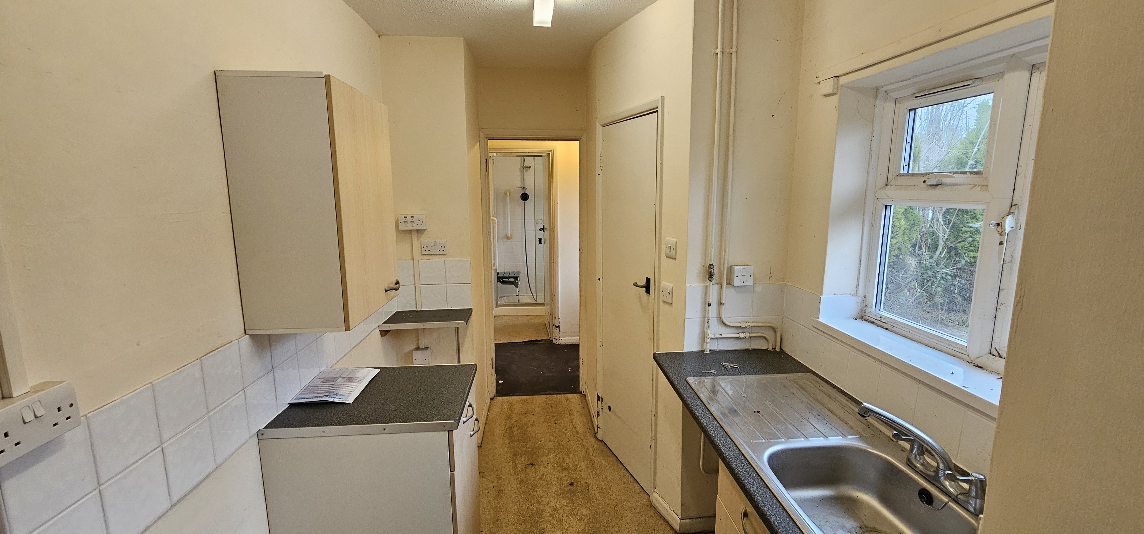VACANT - Freehold Mid Terrace Bungalow