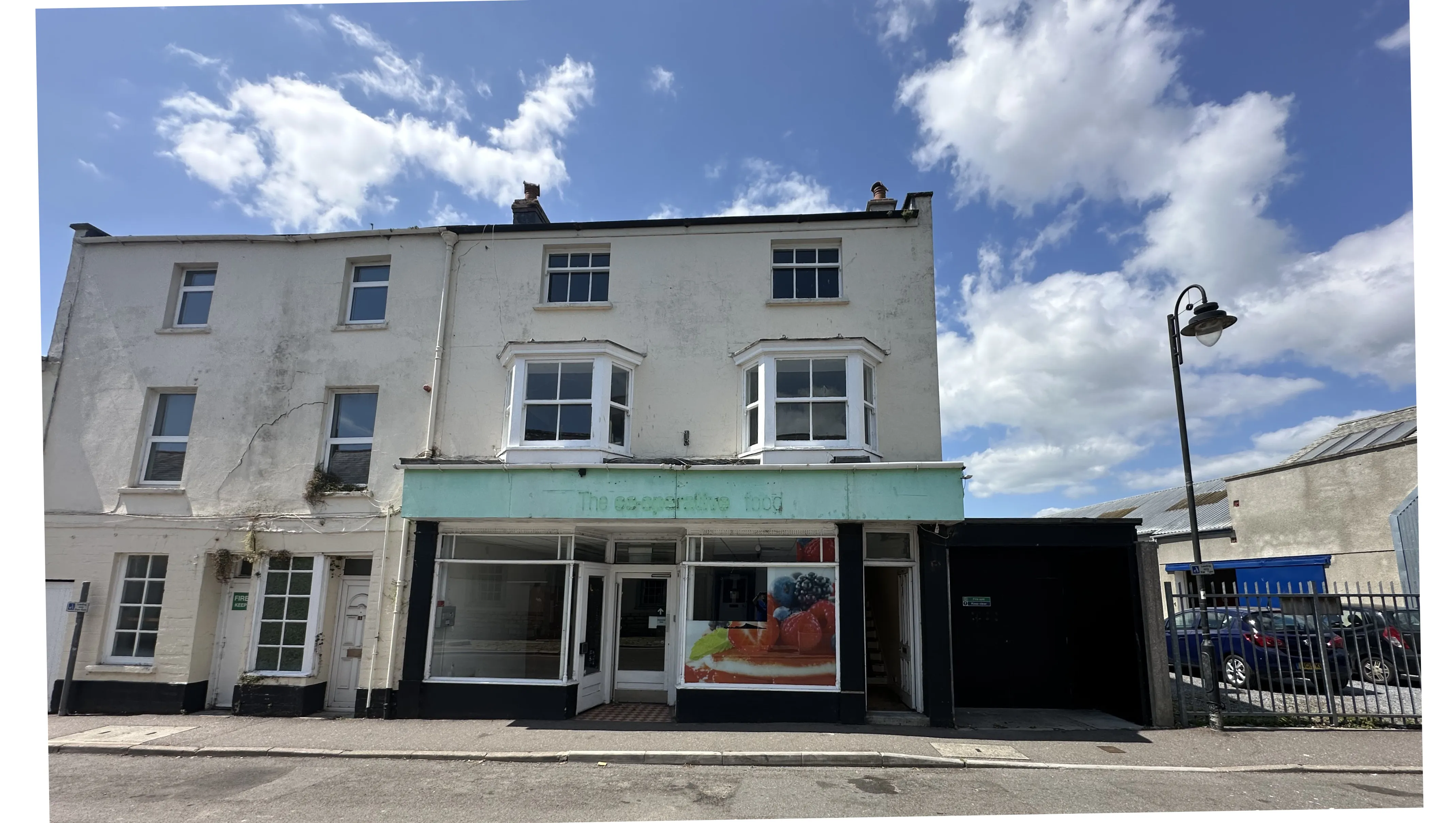 VACANT - Freehold End of Terrace Building with Potential 