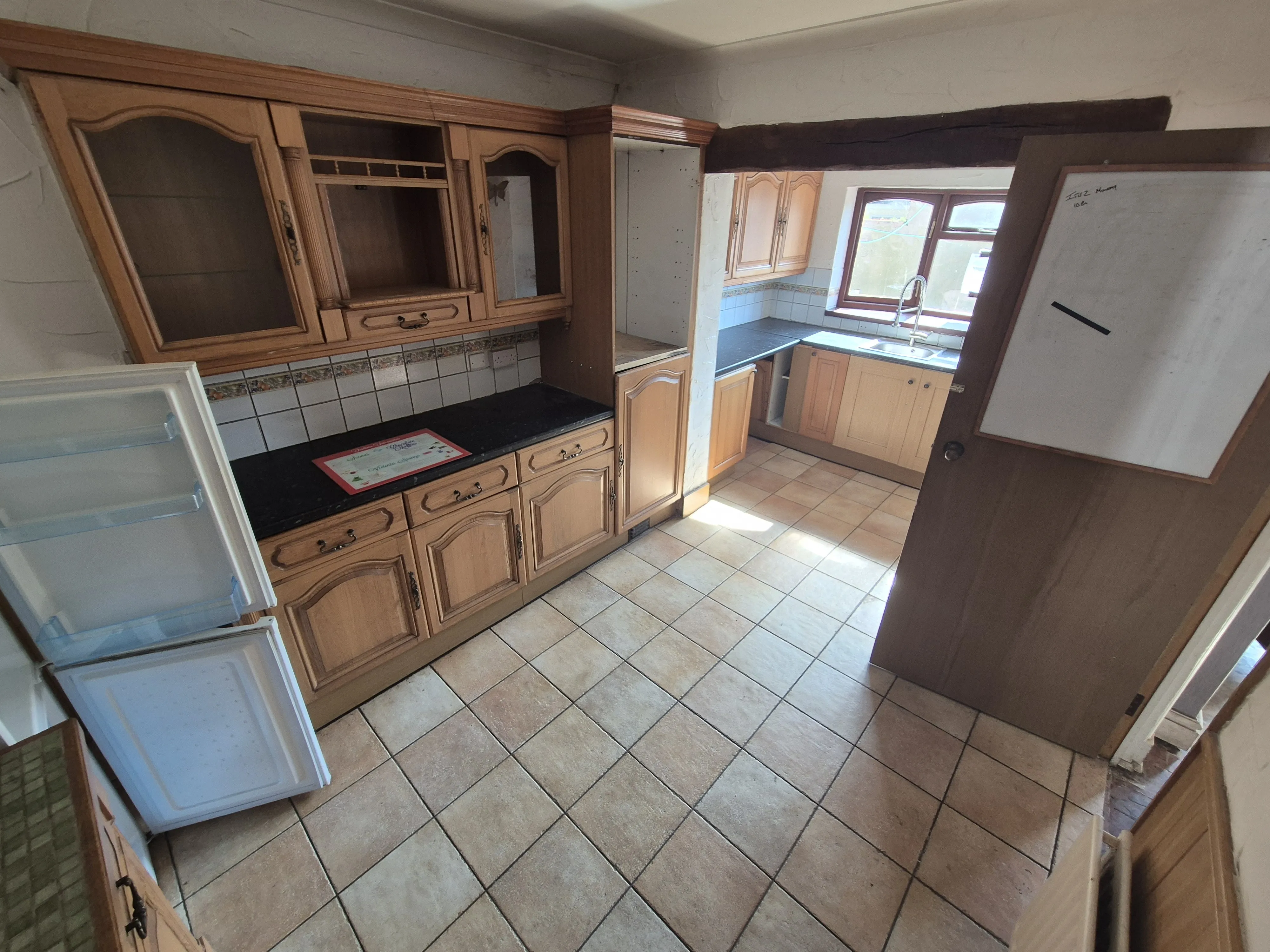 Long Leasehold Mid Terrace House