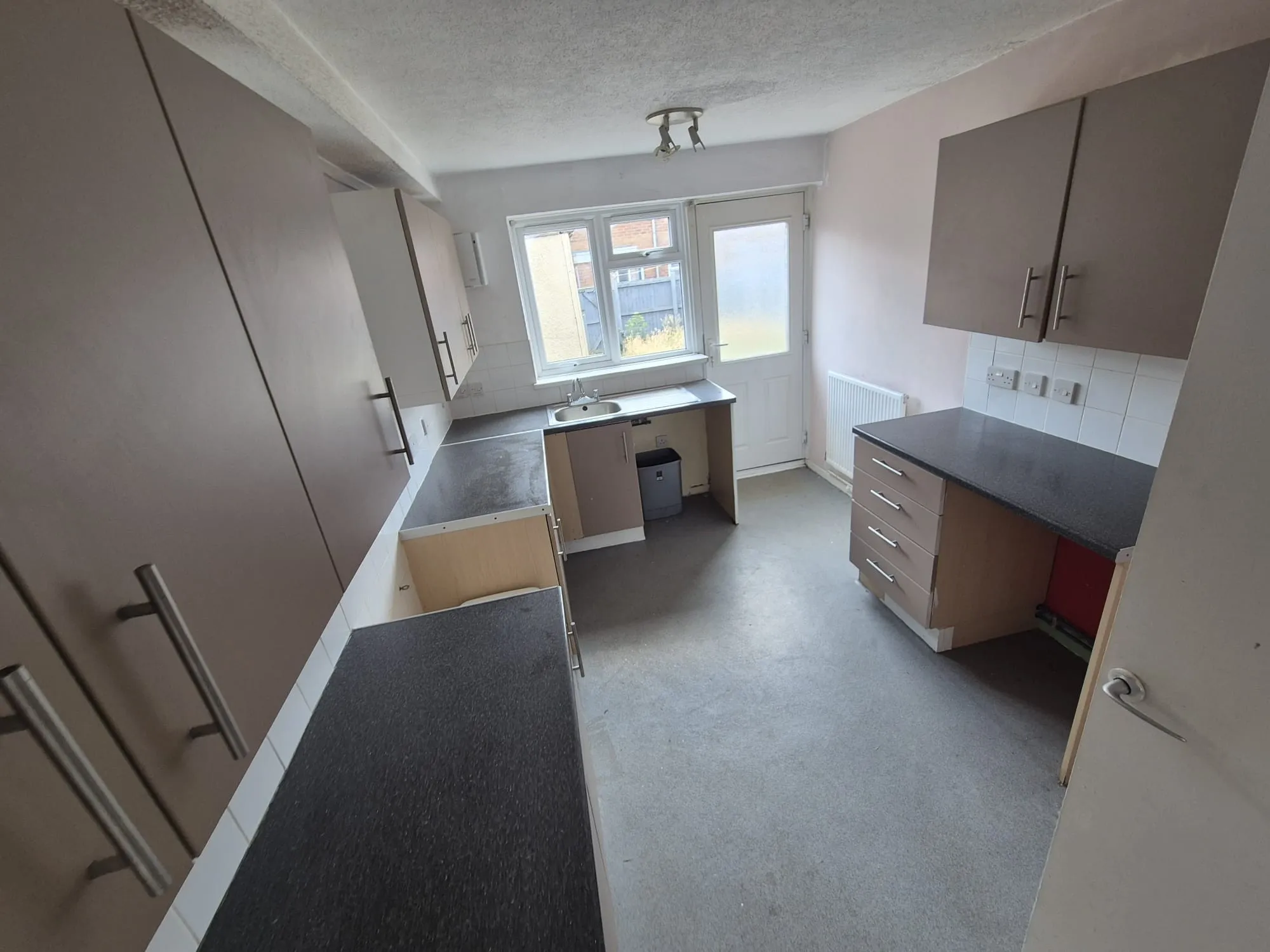VACANT - Freehold Mid Terrace House