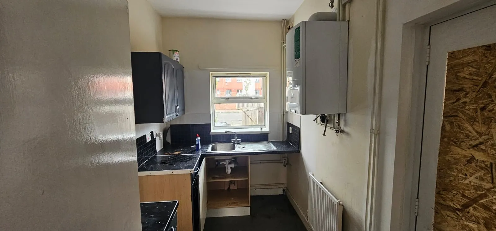 VACANT - Freehold Mid Terrace House