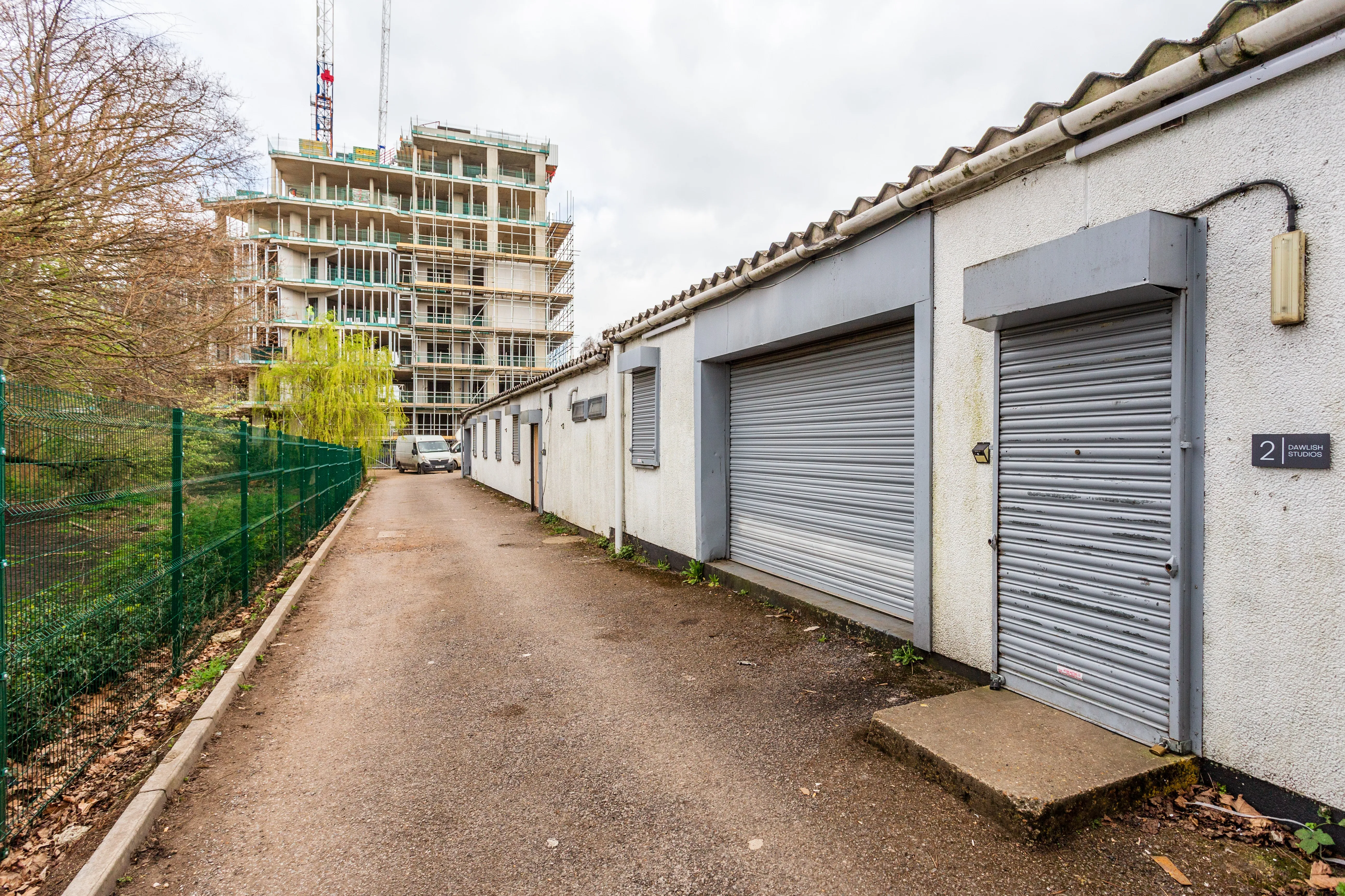 VACANT - Freehold Site with Planning Permission for 12 Private Townhouses