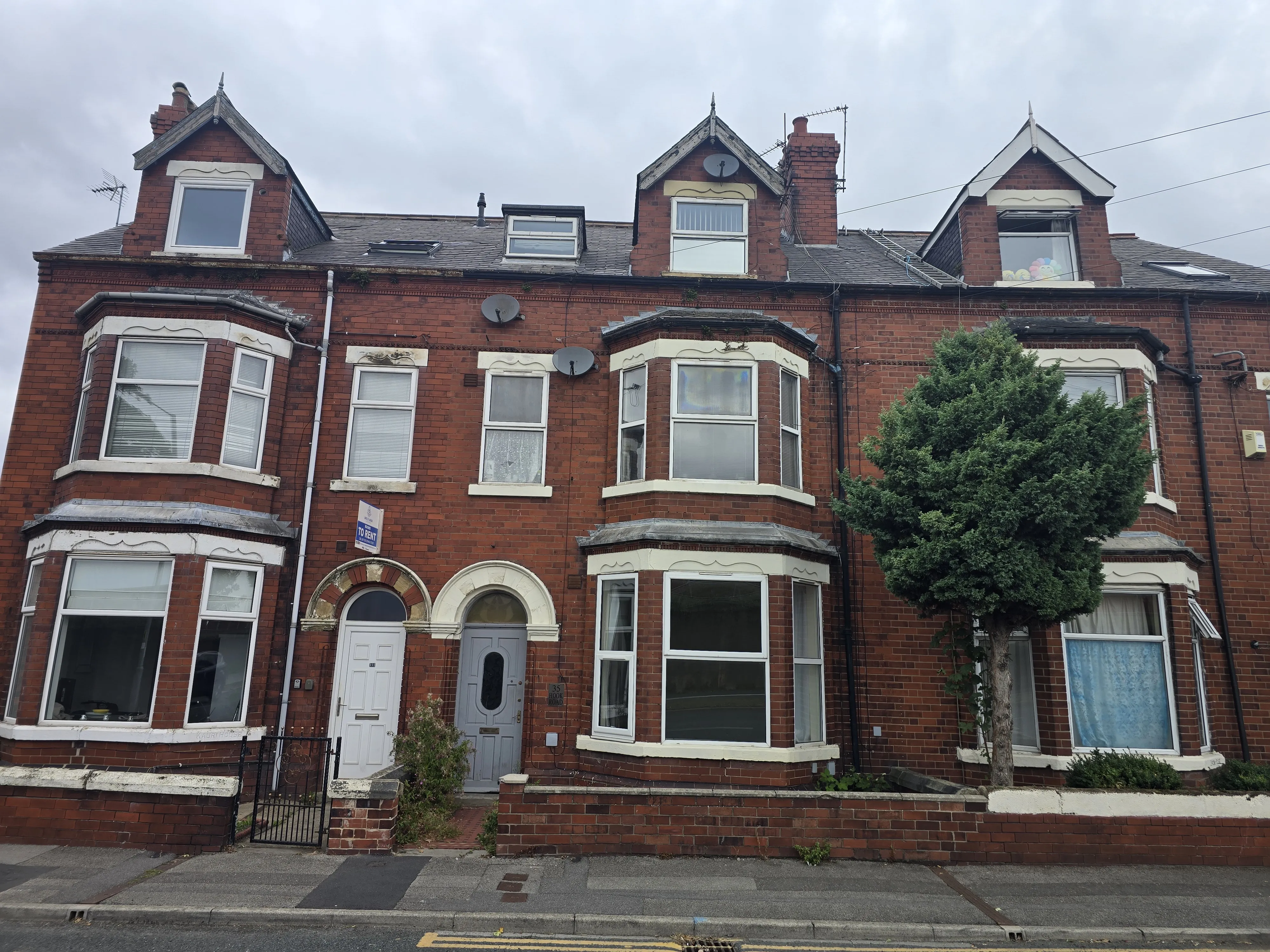 INVESTMENT/VACANT - Freehold Mid Terrace Building providing Four self contained Flats