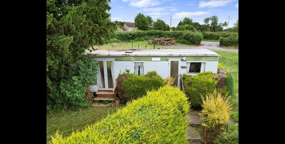 Two bedroom semi-detached stone cottage sitting within approximately two acres of grounds
