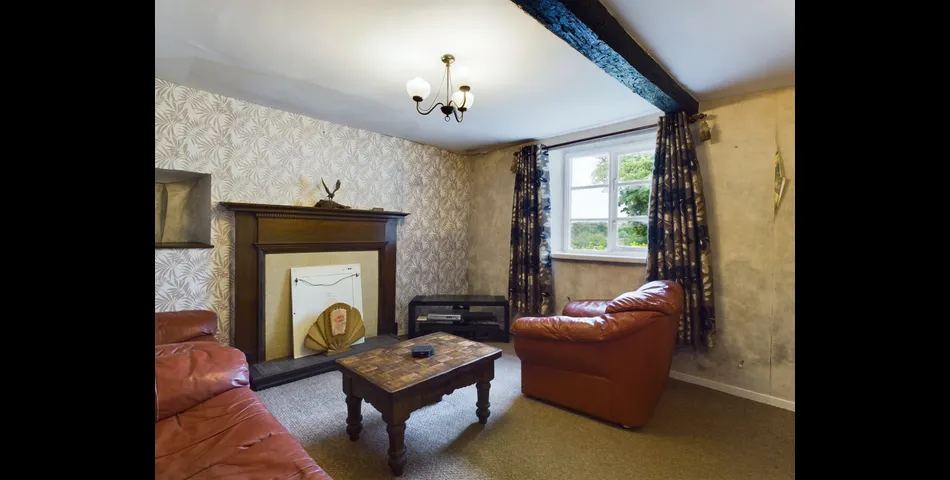 Two bedroom semi-detached stone cottage sitting within approximately two acres of grounds