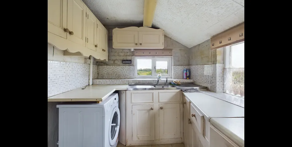 Two bedroom semi-detached stone cottage sitting within approximately two acres of grounds