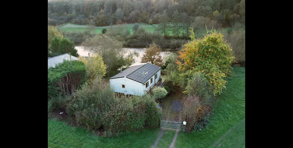 Two bedroom riverside chalet built on stilts to prevent the risk of flooding