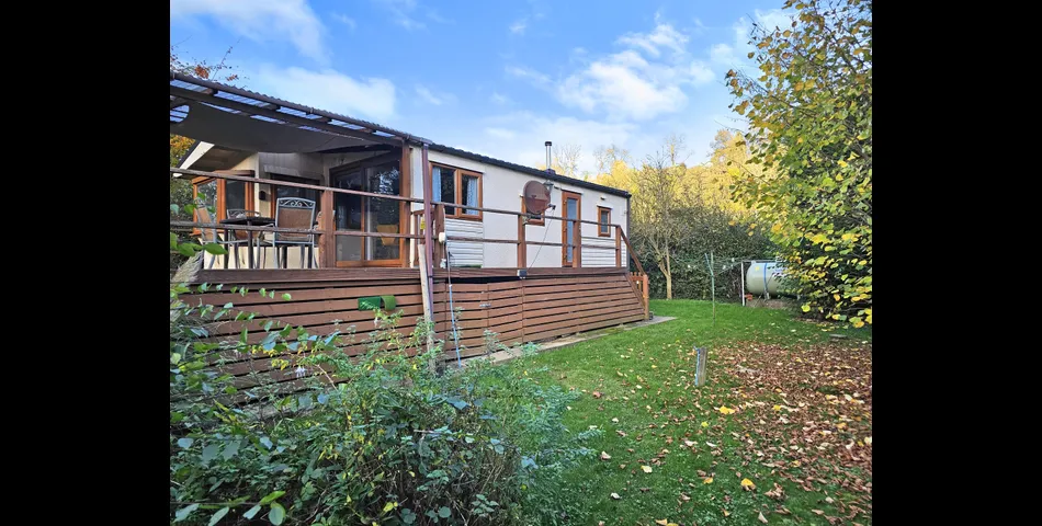 Two bedroom riverside chalet built on stilts to prevent the risk of flooding