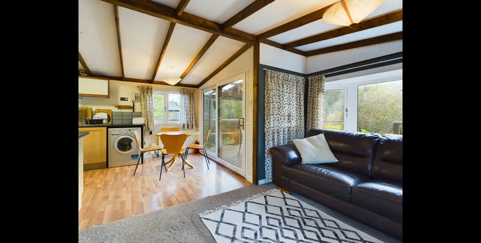 Two bedroom riverside chalet built on stilts to prevent the risk of flooding