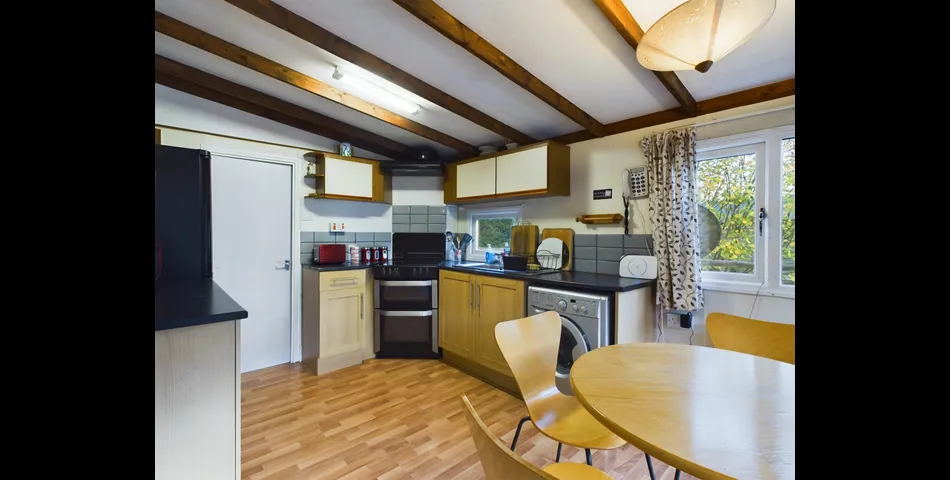 Two bedroom riverside chalet built on stilts to prevent the risk of flooding