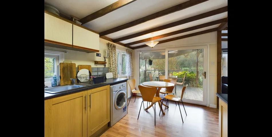 Two bedroom riverside chalet built on stilts to prevent the risk of flooding