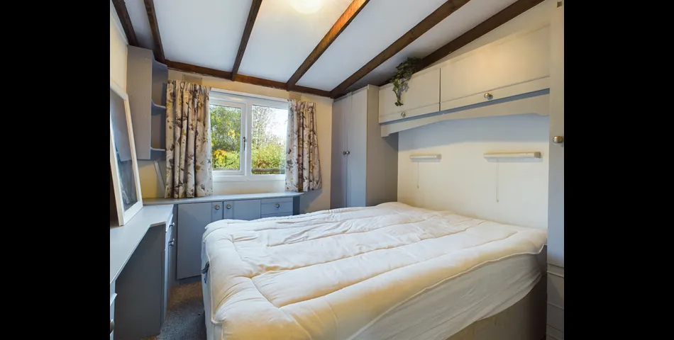 Two bedroom riverside chalet built on stilts to prevent the risk of flooding