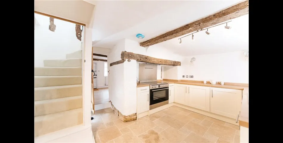 Grade II listed three bedroom end of terrace cottage.