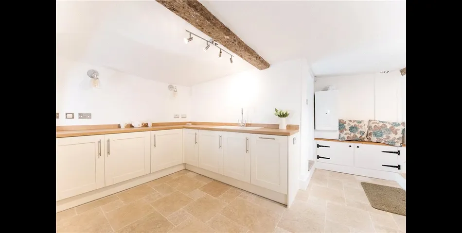 Grade II listed three bedroom end of terrace cottage.