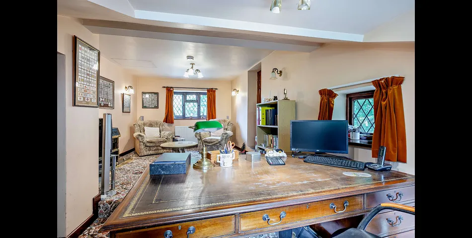 A three/four bedroom detached cottage in need of updating, occupying an elevated position looking over the Severn Valley
