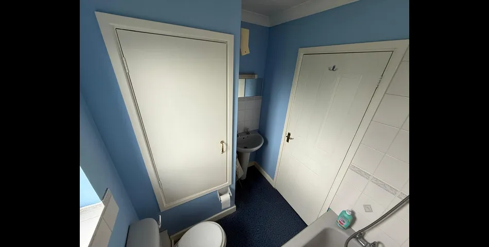 One bedroom end of terrace house with garden and parking space 