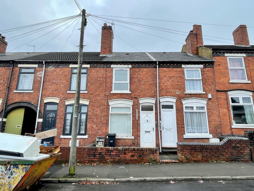 2 bedroom mid terraced house converted into two self-contained flats in Halesowen