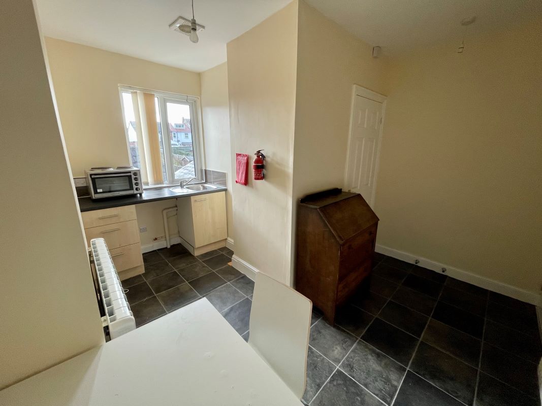 2 bedroom mid terraced house converted into two self-contained flats in Halesowen