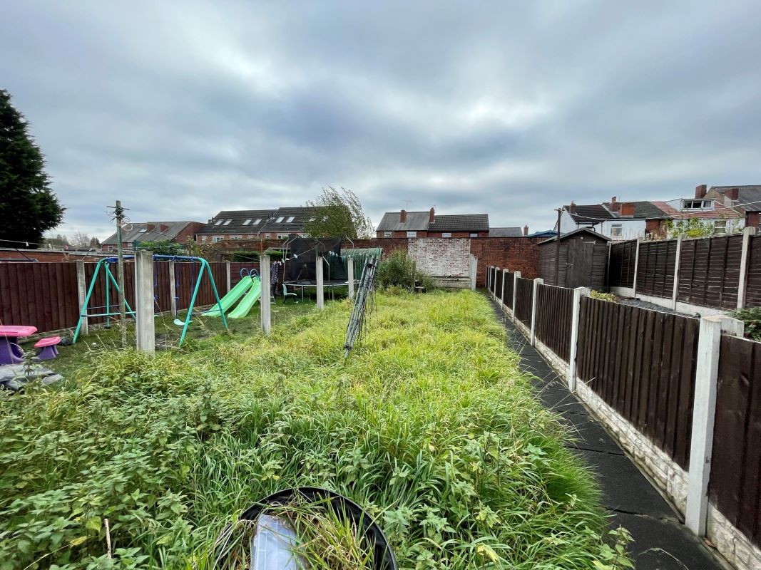 2 bedroom mid terraced house converted into two self-contained flats in Halesowen