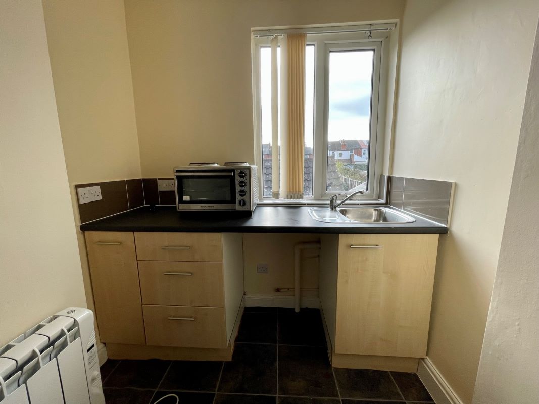 2 bedroom mid terraced house converted into two self-contained flats in Halesowen