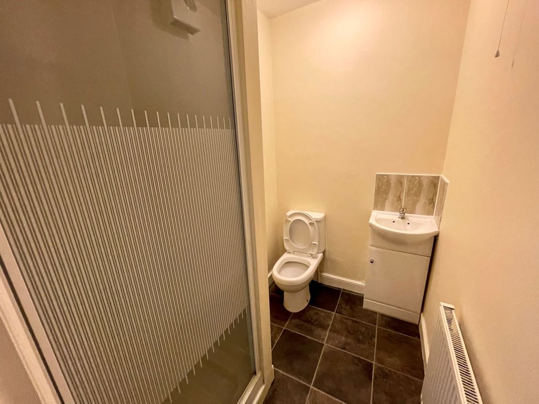 2 bedroom mid terraced house converted into two self-contained flats in Halesowen