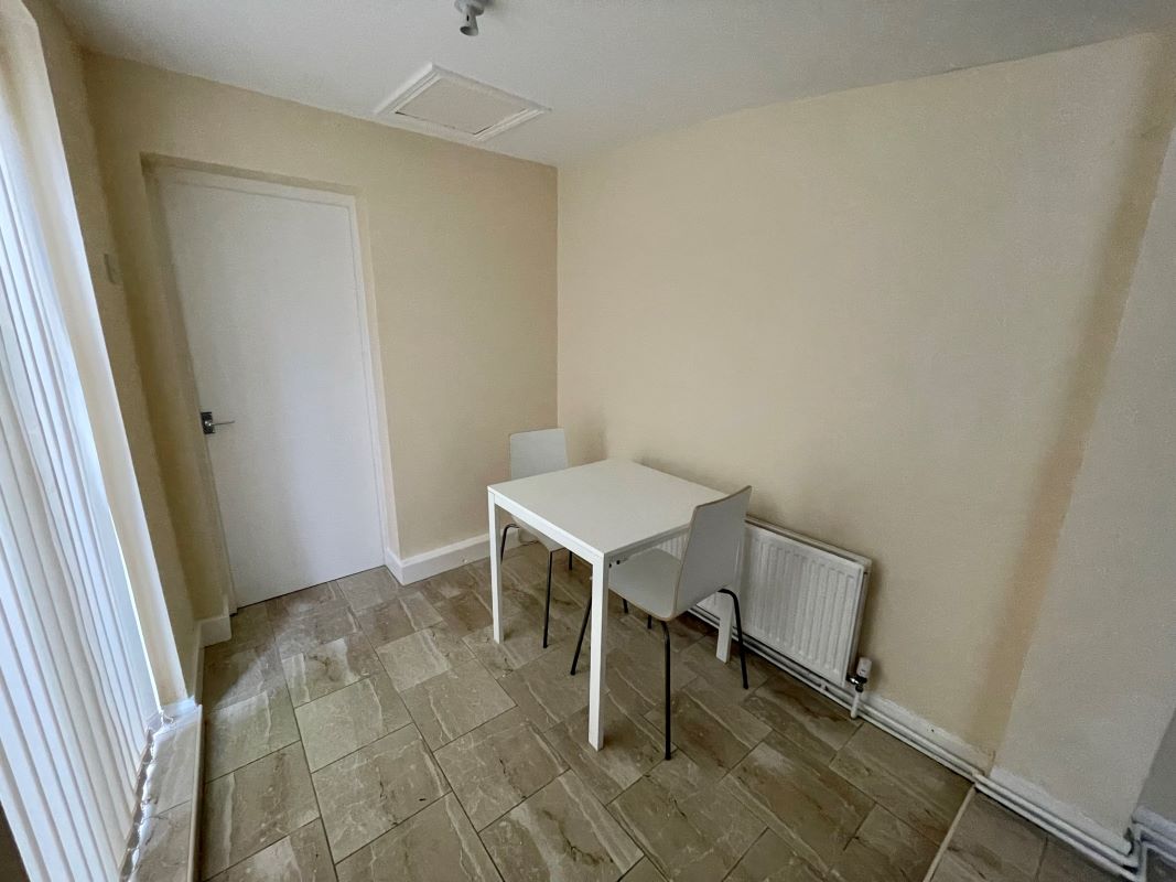 2 bedroom mid terraced house converted into two self-contained flats in Halesowen