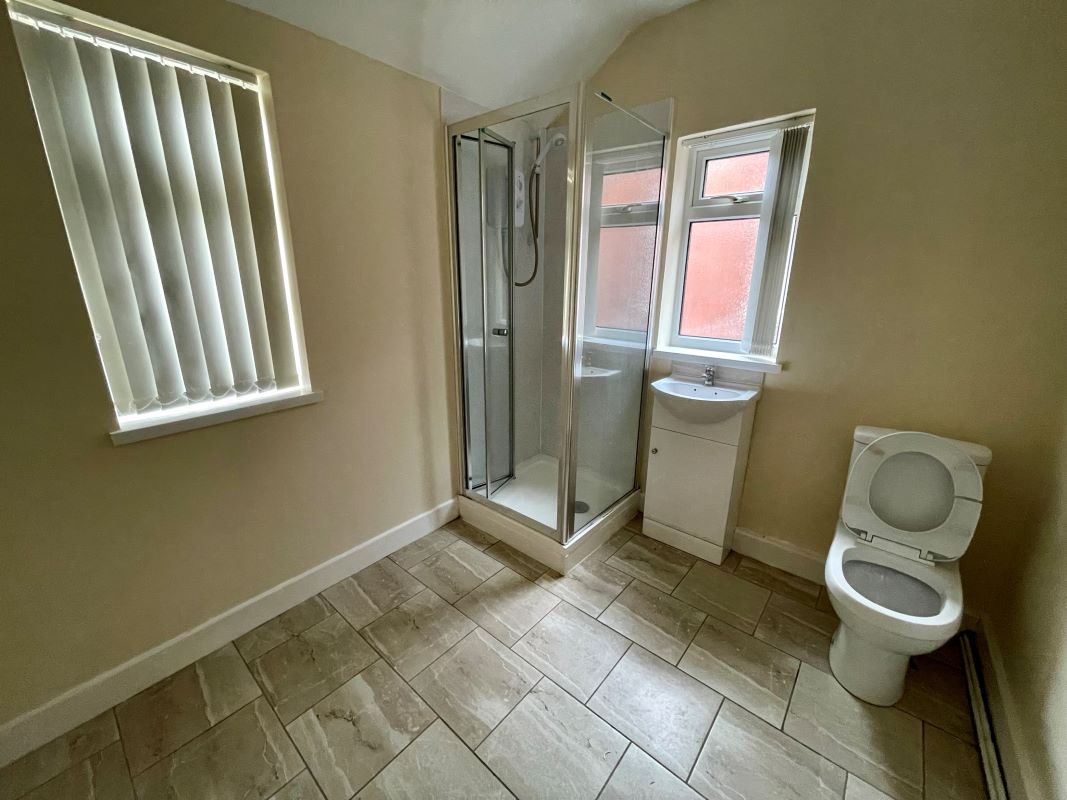 2 bedroom mid terraced house converted into two self-contained flats in Halesowen