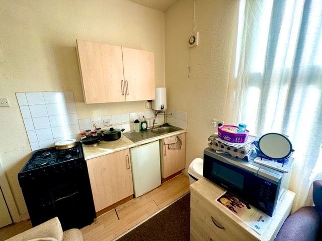 5 bedroom end terraced house converted into four apartments and one studio in Coventry