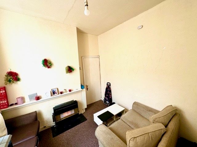 5 bedroom end terraced house converted into four apartments and one studio in Coventry