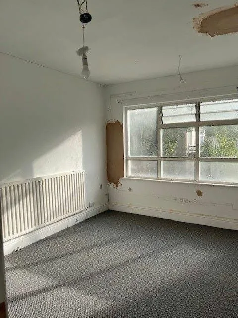 Freehold town centre office building in Walsall with prior planning approval for five studio flats