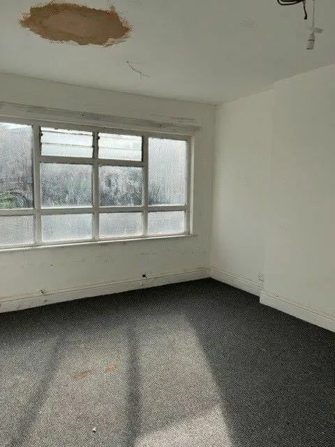 Freehold town centre office building in Walsall with prior planning approval for five studio flats