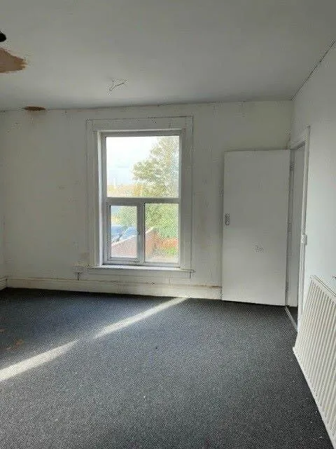 Freehold town centre office building in Walsall with prior planning approval for five studio flats