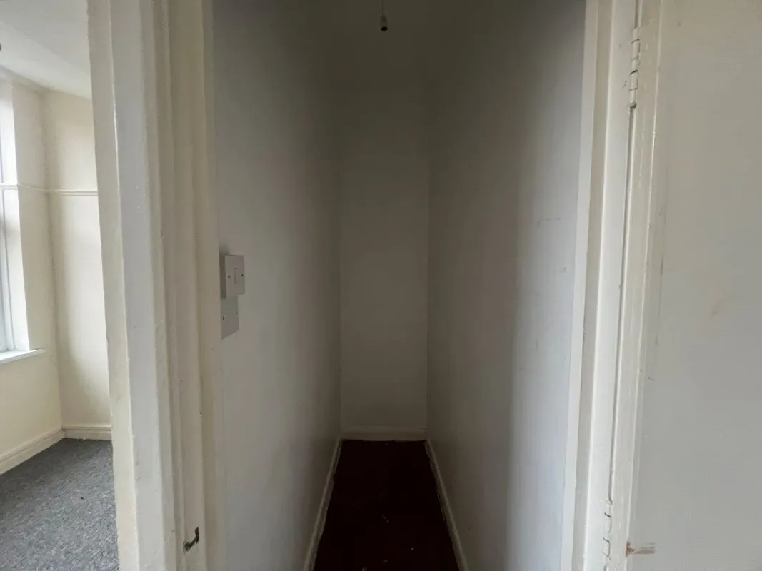 A vacant freehold three storey row of three terraced properties in Balsall Heath 