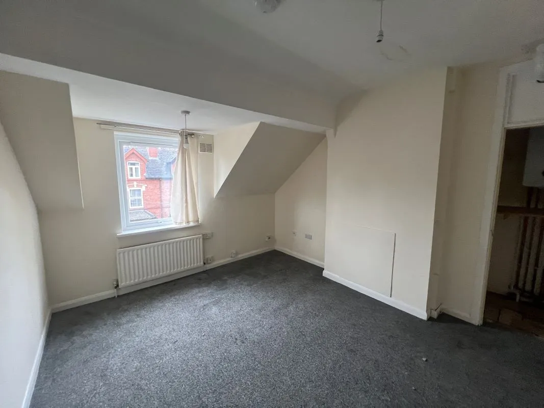 A vacant freehold three storey row of three terraced properties in Balsall Heath 