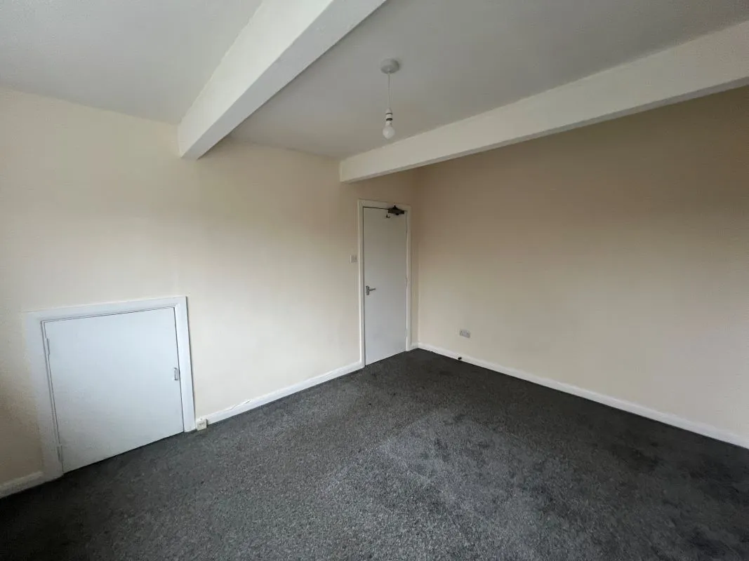 A vacant freehold three storey row of three terraced properties in Balsall Heath 