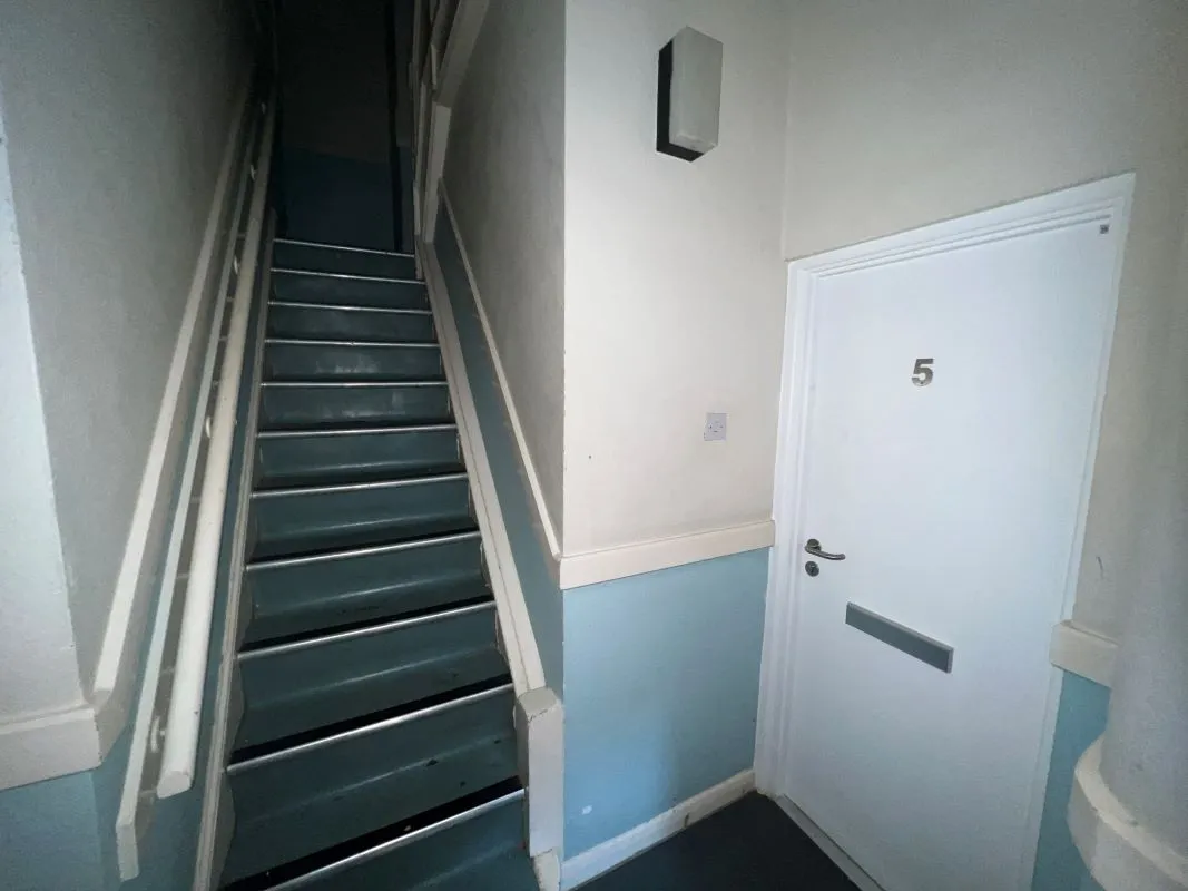 A vacant freehold three storey row of three terraced properties in Balsall Heath 